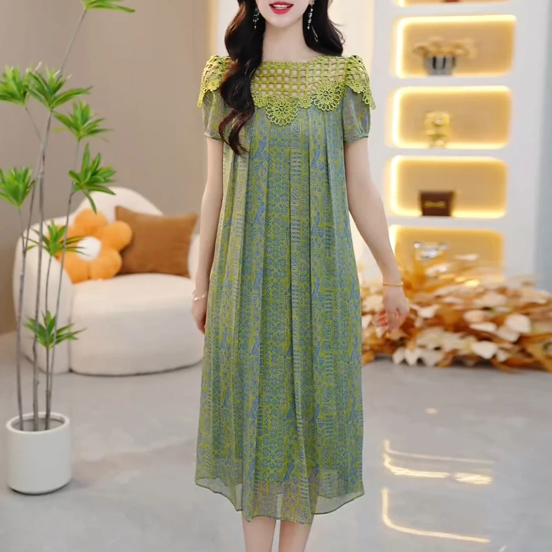 气质宽松百搭印花圆领连衣裙2025夏季新款遮肚洋气减龄中长款裙子