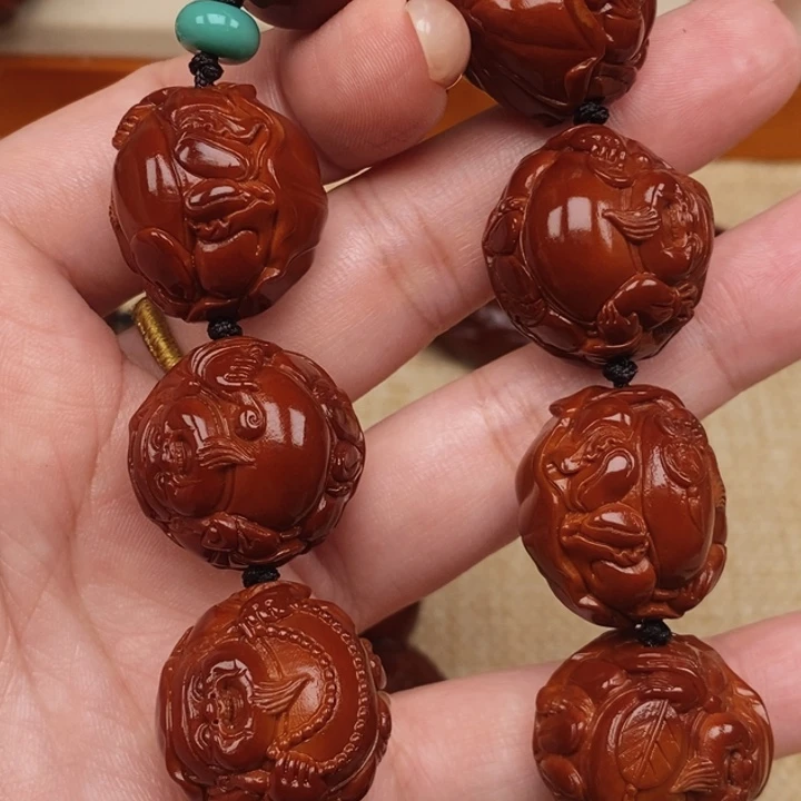 甄***）橄榄核吊坠横财神