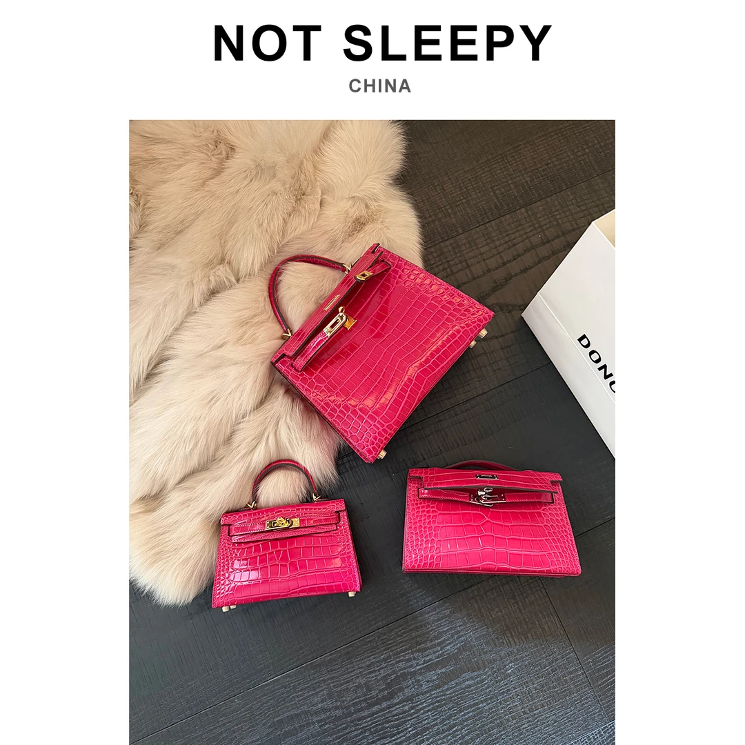 "进口头层牛皮压亮面鳄鱼纹"迷你二代凯莉包女单肩斜挎包/玫紫色