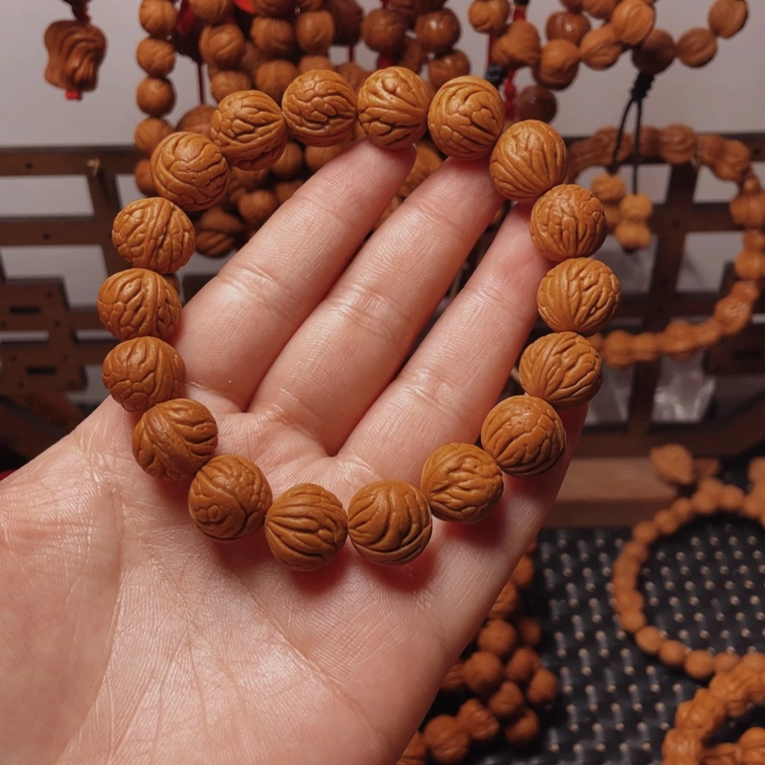 木质类龙纹桃枭手串