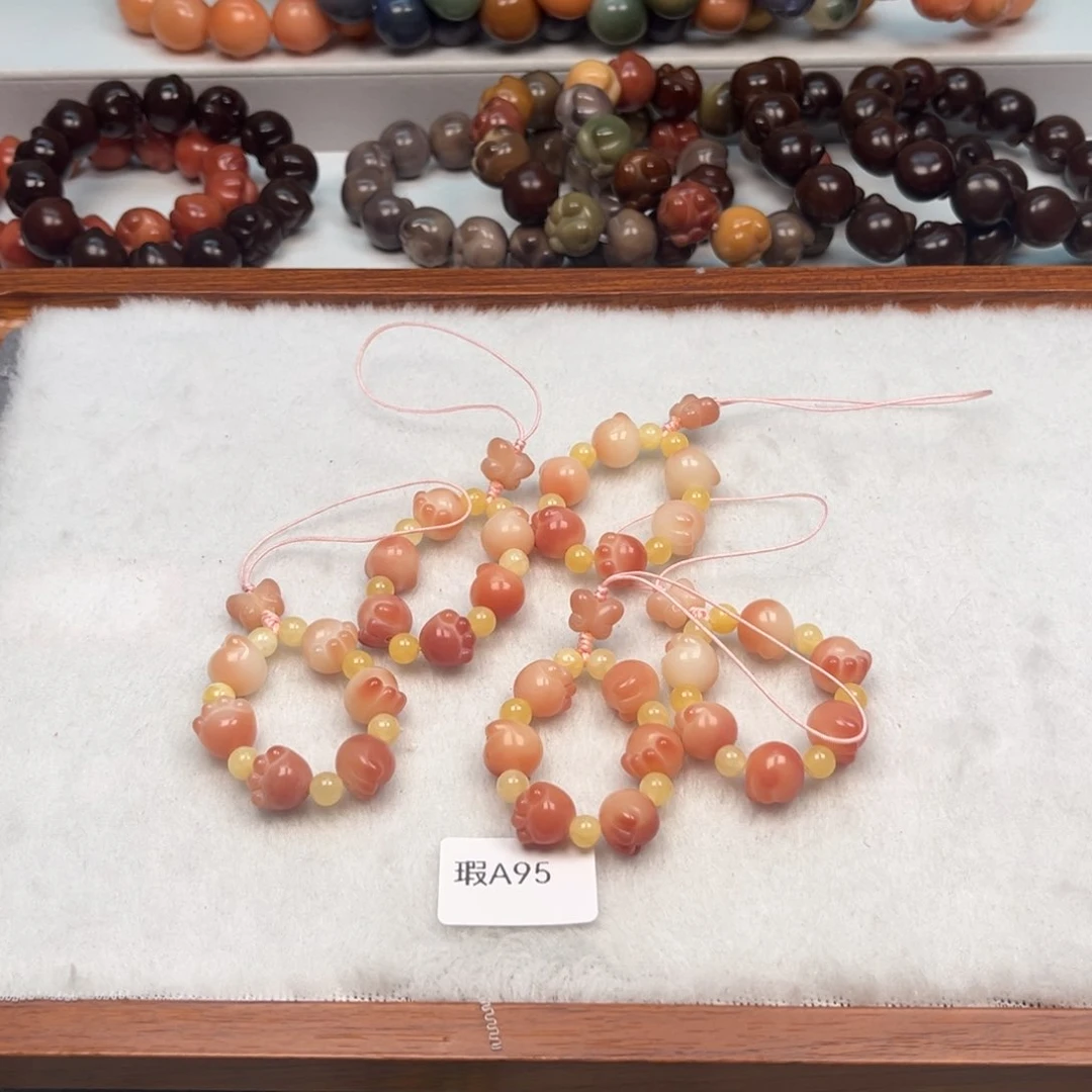 菩提根/象牙果手串瑕a95手机挂随机一个11mm