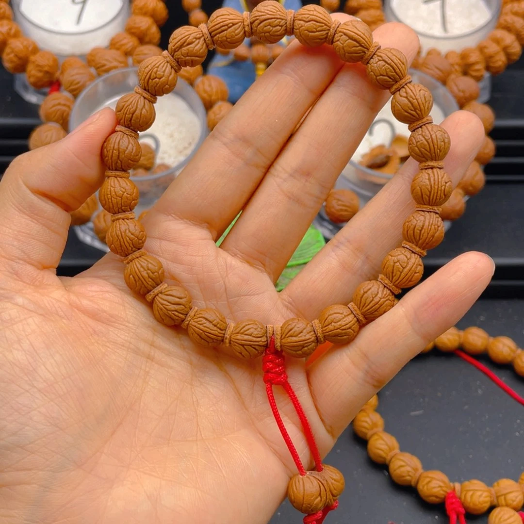 范***_桃核吊坠见健健康康平平安安8