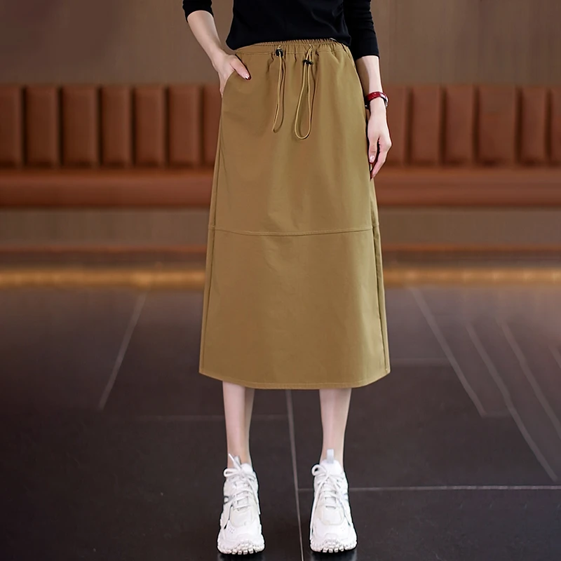 美拉德休闲半身裙女2025春秋新款松紧腰宽松显瘦中长款工装包臀裙