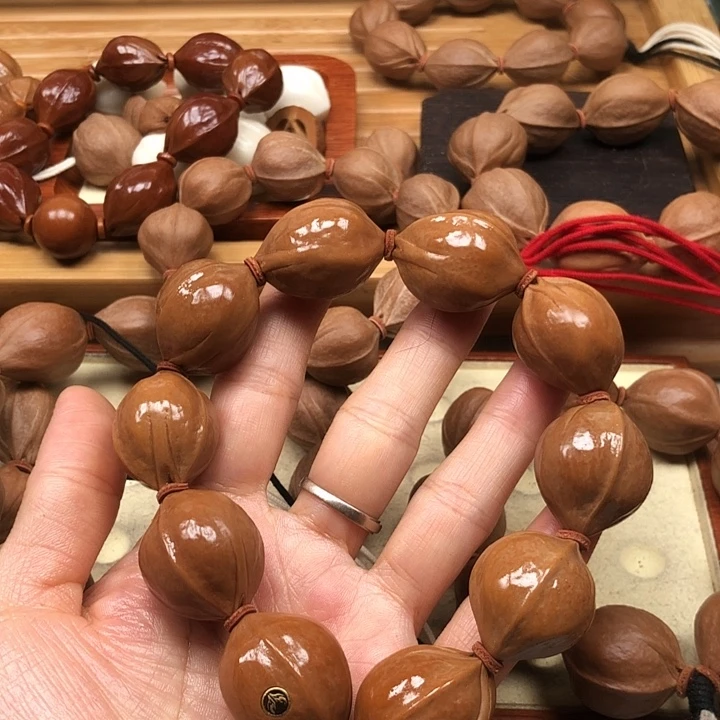 手串橄榄核梅林铁核22 X28带金银标