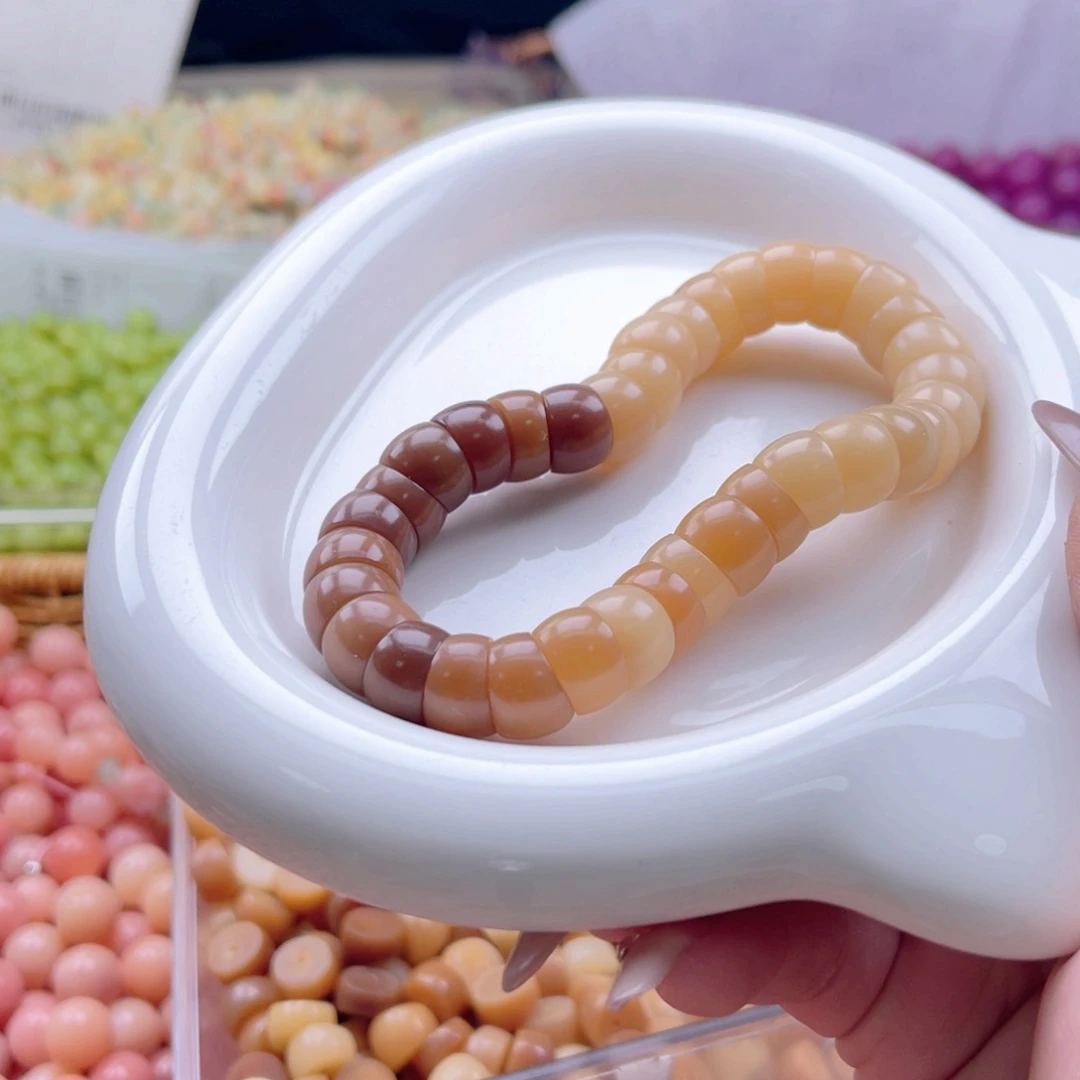白玉菩提吊坠z11-12mm108颗。太妃糖大肠微瑕