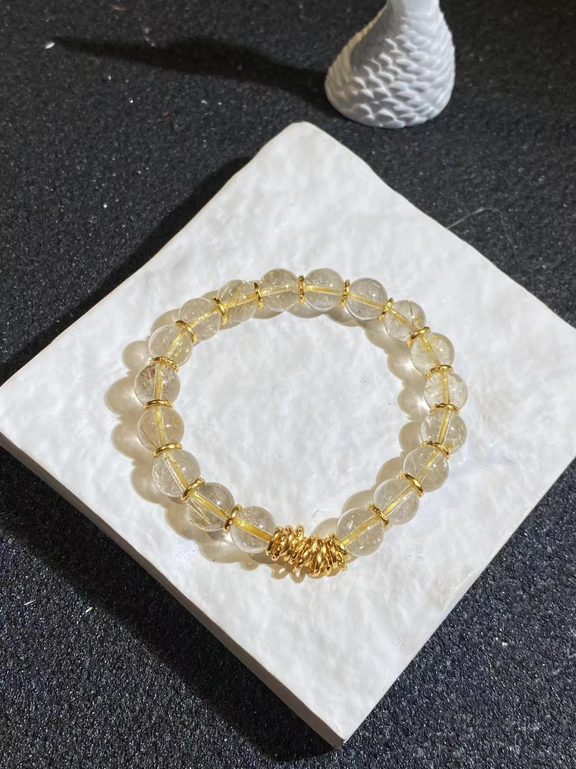 （腰缠万贯）卡8+mm金发晶手串F1422