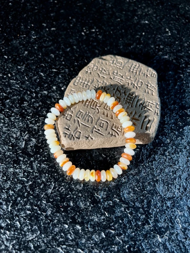 四维籽玉*和田玉子料红皮白肉算盘珠手串串珠