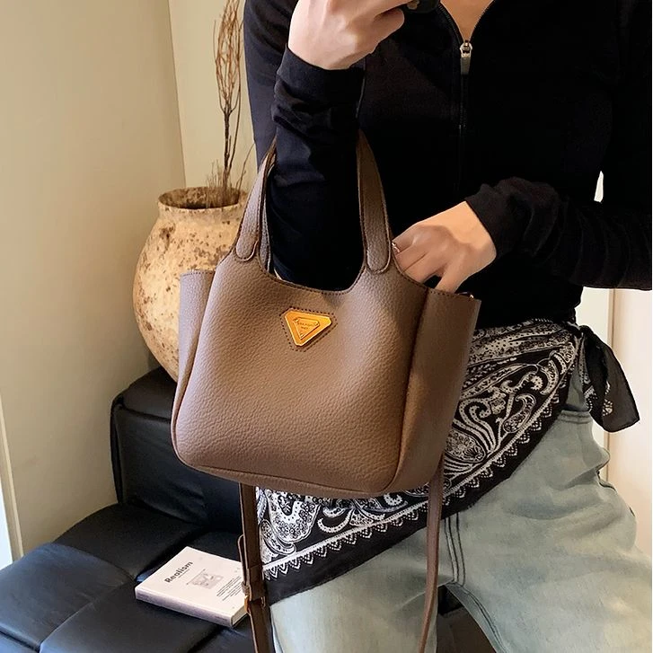 春季2025复古手提菜篮包包女新款潮韩国小众水桶包百搭单肩斜挎包