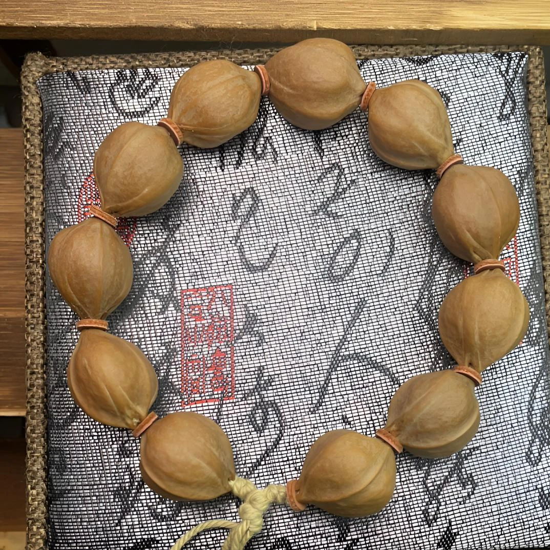 1723精品梅林铁核 橄榄核素串