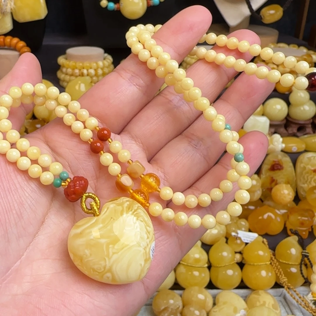 琥珀未镶嵌套链天然溶洞妖花蜜蜡爱心吊坠毛衣链