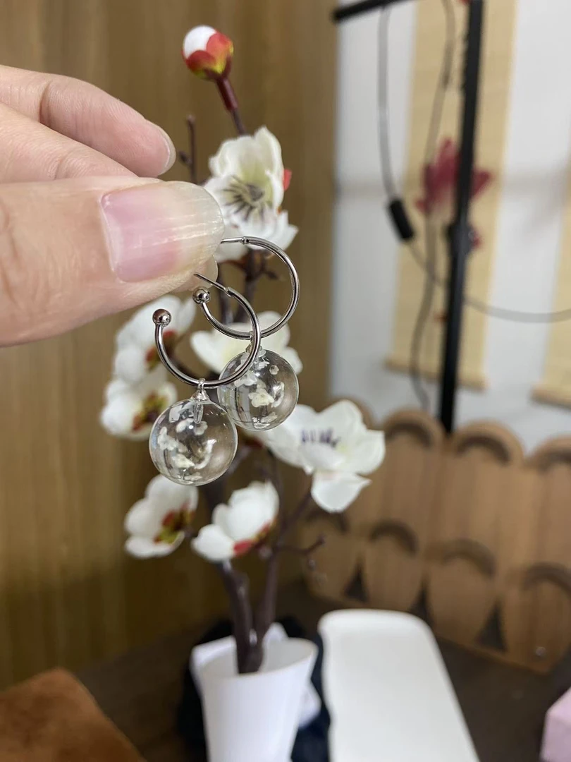 设计款925银镶嵌白水耳环LC101