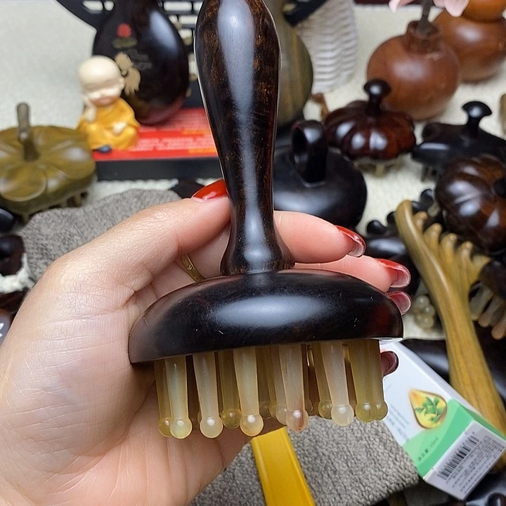 小***柔紫光檀手柄款按摩羊角梳