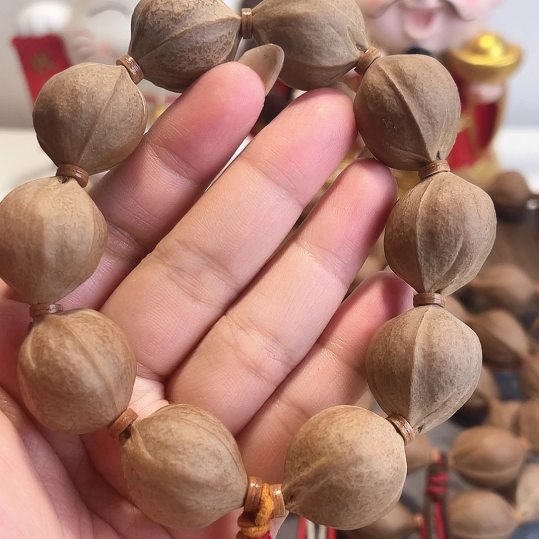 阿***说橄榄核手串/手链梅林