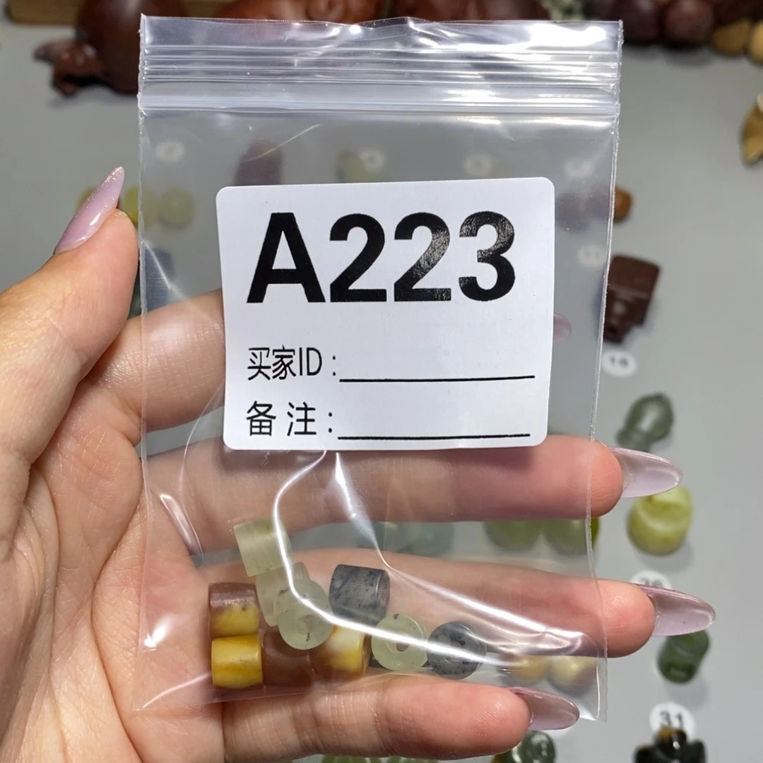 蛇纹石玉合金颈饰核**陈