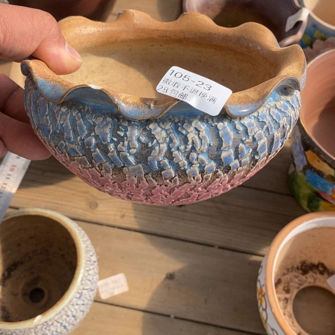 23号花盆内12.5高8.5瑕疵