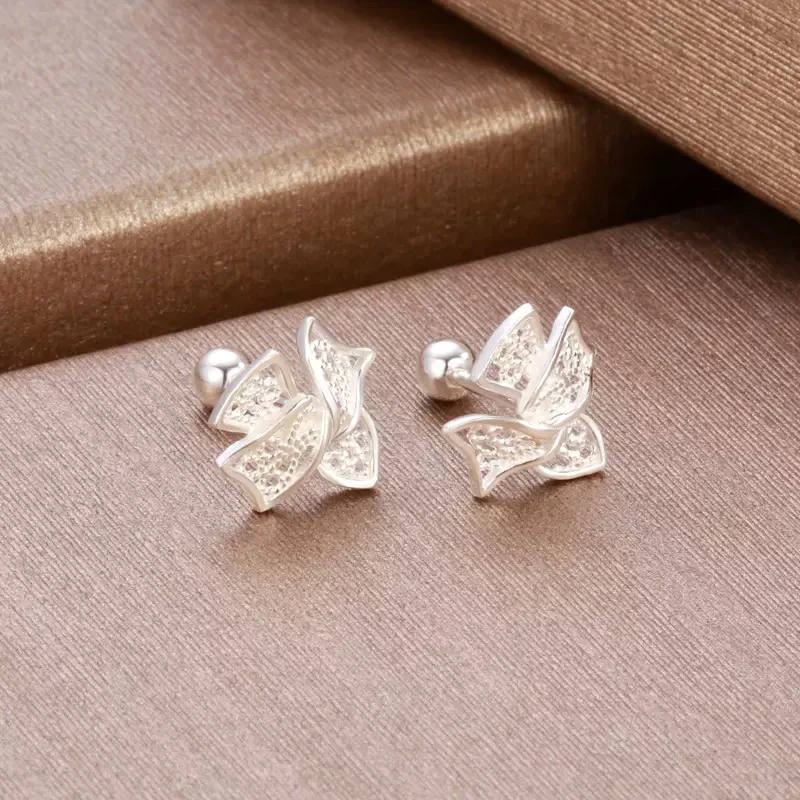 足银耳饰 999银镂空蝴蝶结耳钉女养耳洞螺丝拧扣小众