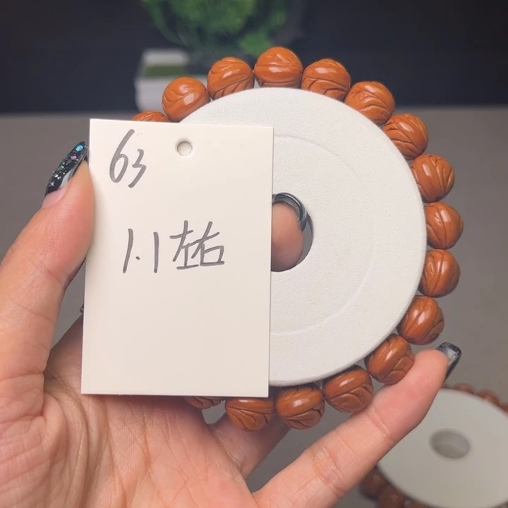 桃核吊坠秦岭龙纹桃核手持