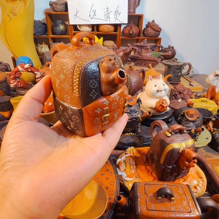 啦***啦紫砂茶壶纯手工制作过程就是