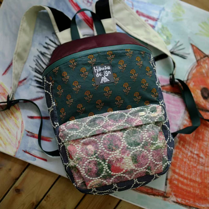 housedesign致敬2025夏新休闲刺绣双肩包大容量撞色通勤电脑包女