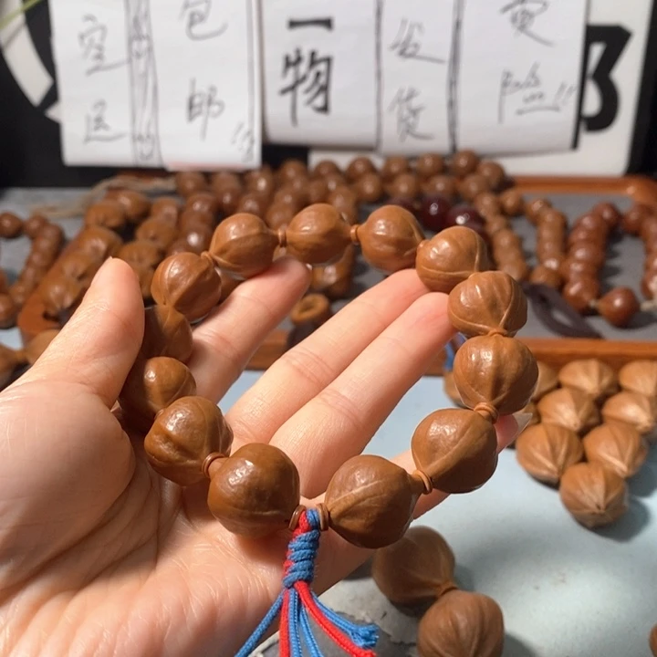 莽***夫手串橄榄核0271精品蒜头铁核12+1颗