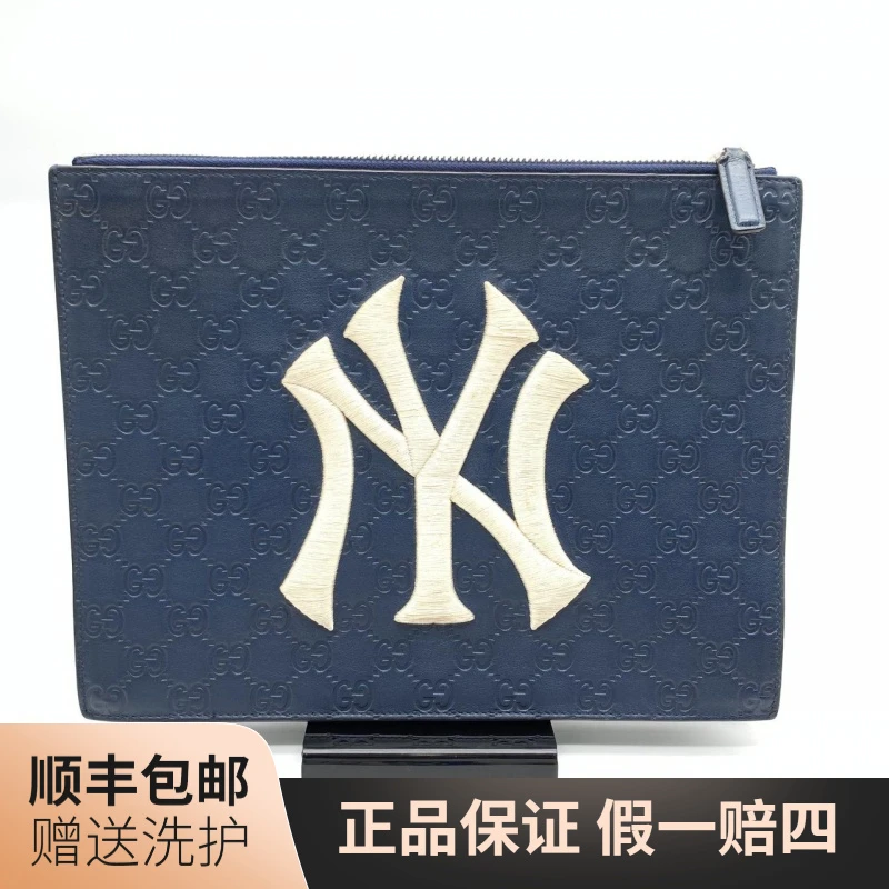 95新 GUCCI/古驰   古驰蓝色NY手拿包/10012452经典深蓝奢侈男士