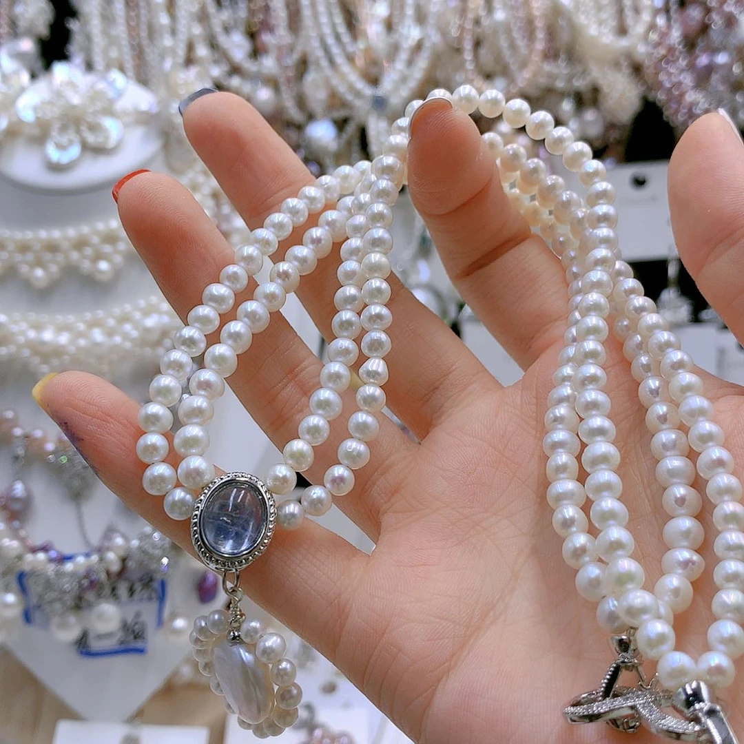 银S925镶嵌耳饰淡水珍珠碰*