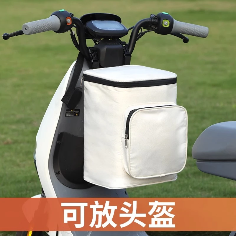 电动车头盔挂物包大号电瓶车防水前置兜雅迪爱玛神器雨衣收纳