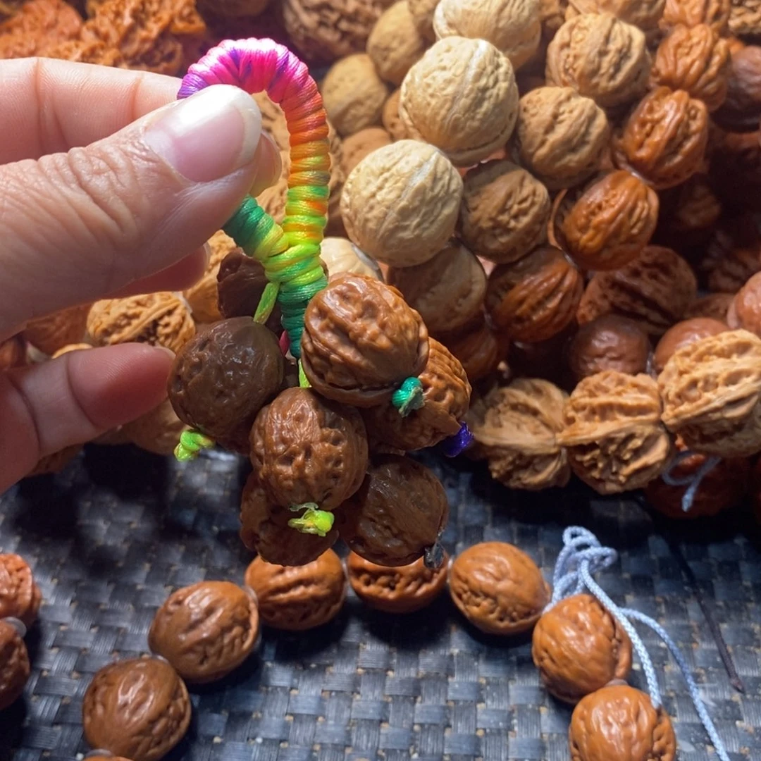 Ö***椰文玩核桃吊坠葡萄串