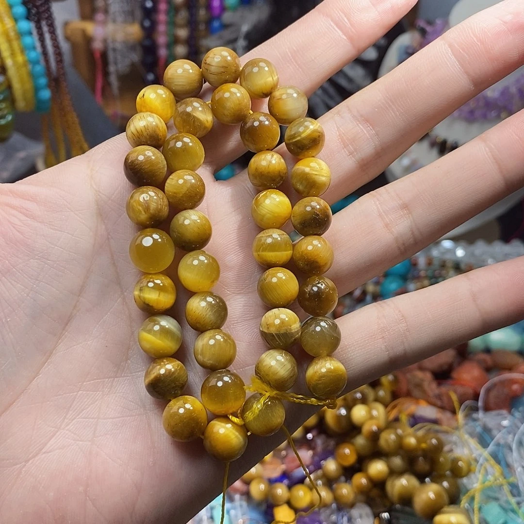 毛***儿石英质玉未镶嵌，金虎眼10mm，