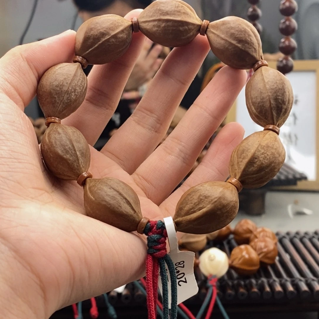 手串橄榄核随**看梅林铁