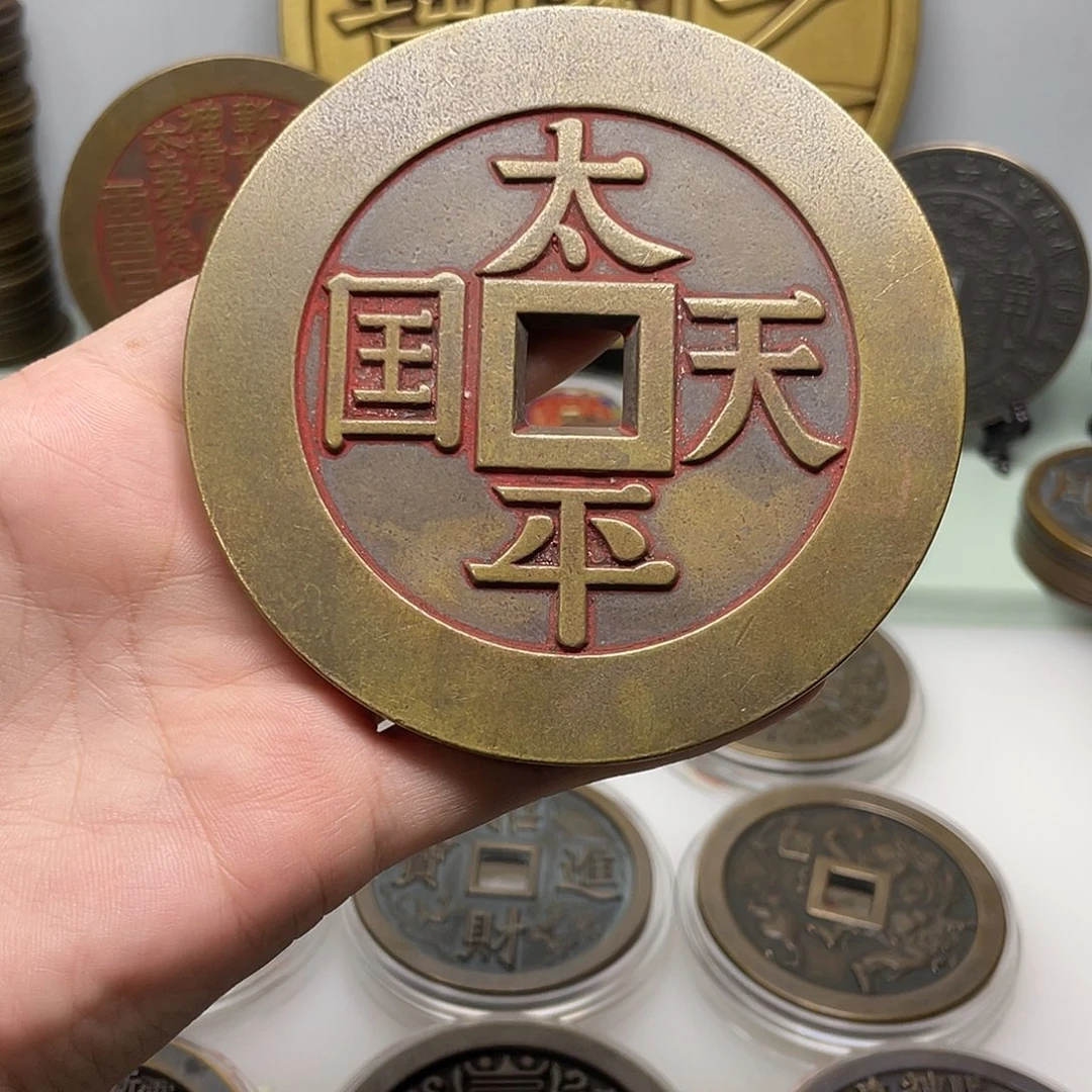 憬***：铜风磨铜材质，退役母钱(15年)