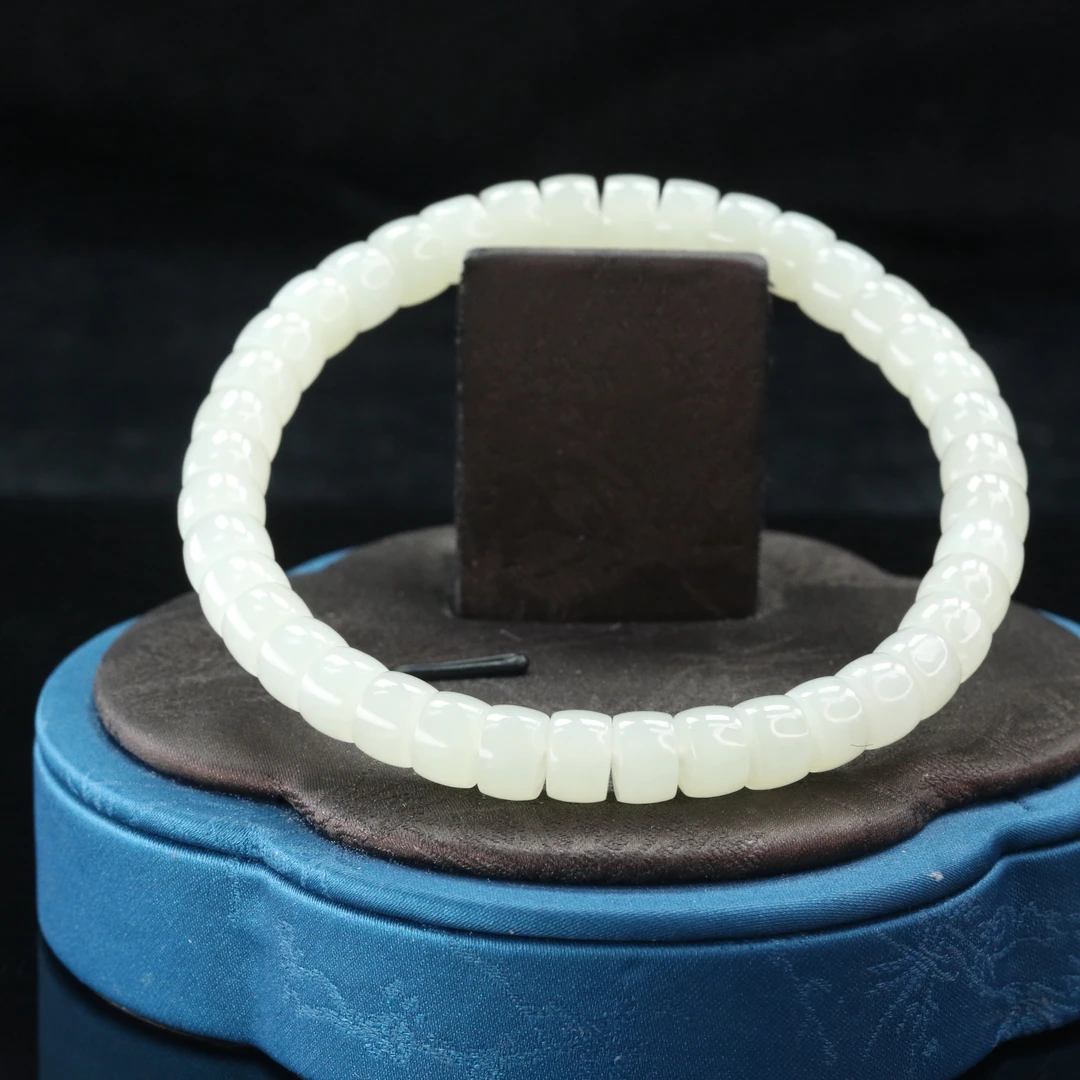 52和田玉蜂蜜水手串/000239保利厦门拍卖