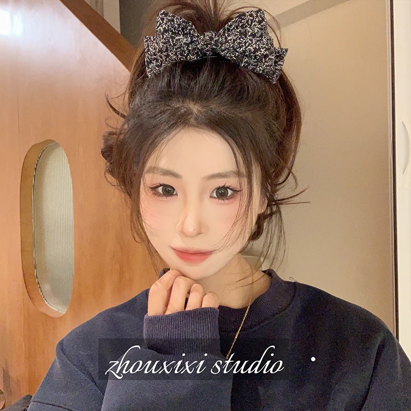 优雅碎花蝴蝶结丸子头抓夹女高级感扎高马尾发夹头饰2025新款