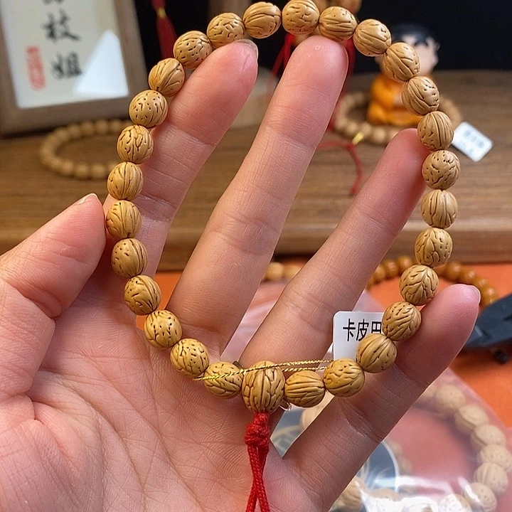 李***闯桃核手串卡皮巴拉0.9 抛光