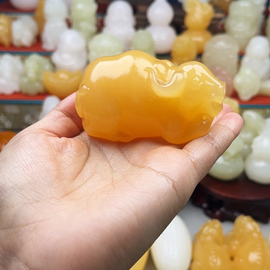 云***游石材牛牛手把摆件