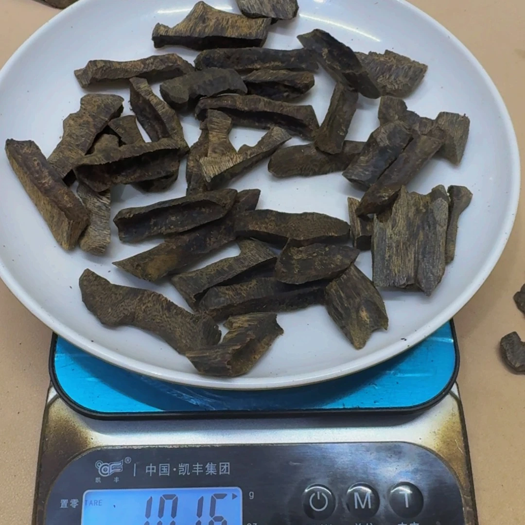 闲***趣沉香碎屑沉香紫棋高端两面刮101克