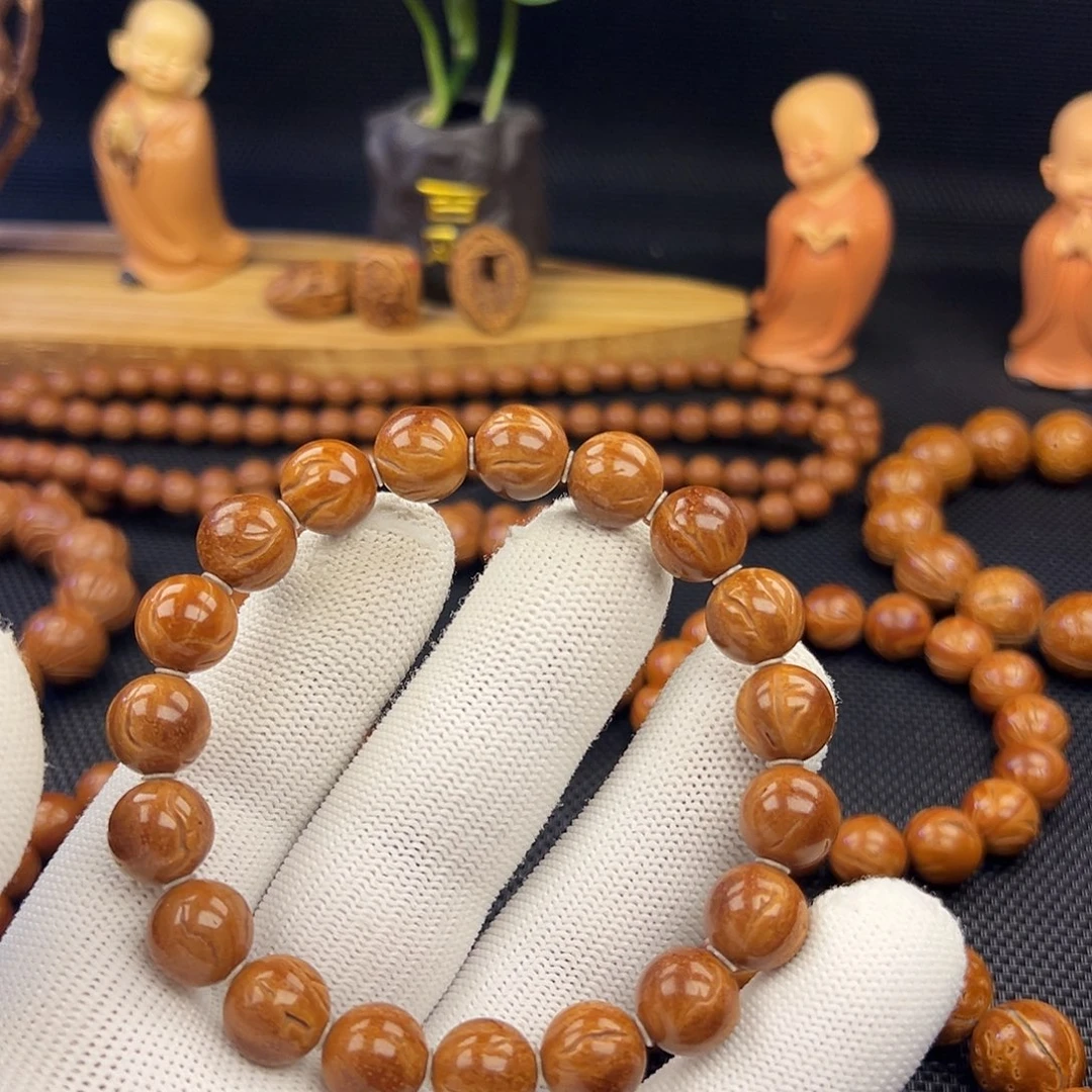 春***灬野生龙纹桃核光珠