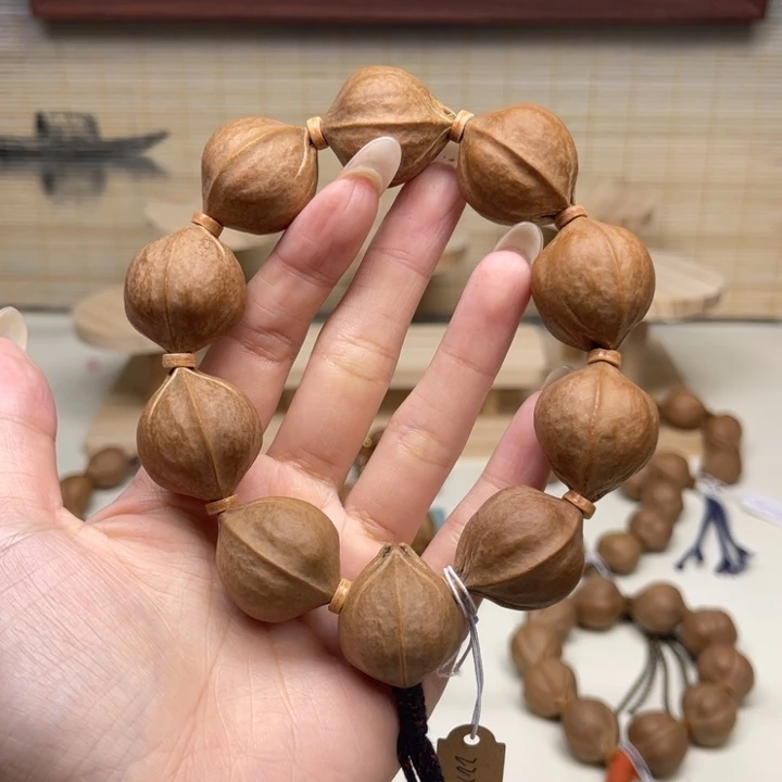 拿***吧手串/手链橄榄核22.26精品梅林铁核
