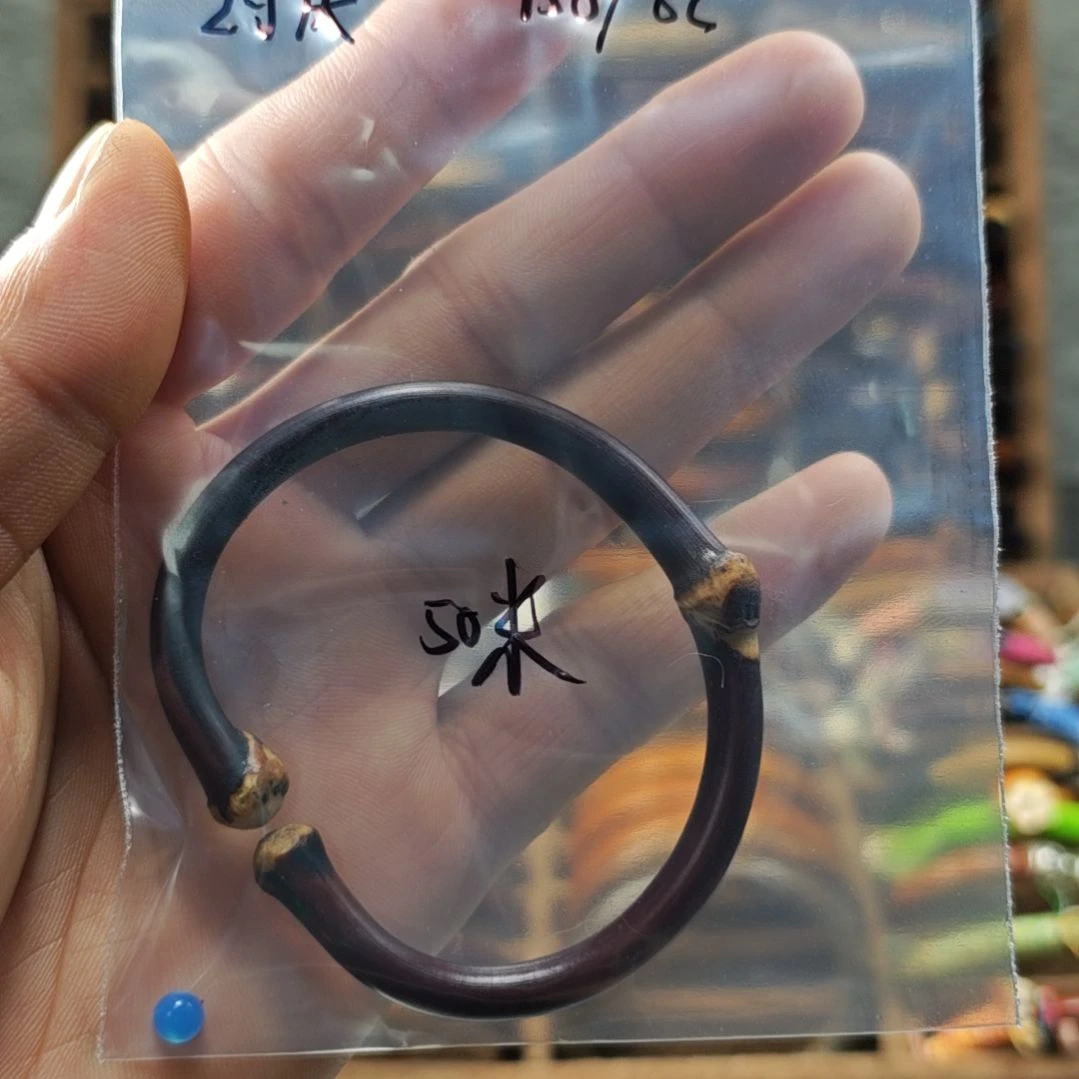 讨****木质非金属鸡血藤手镯镶嵌款。