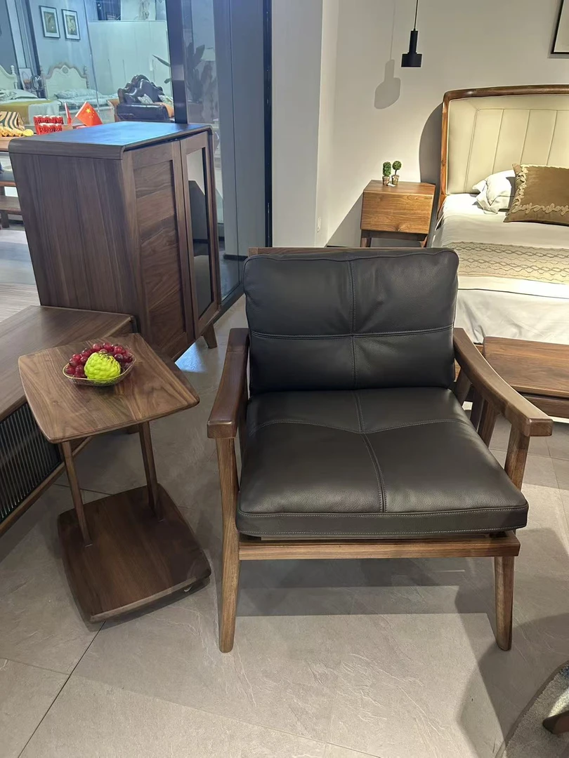 北欧黑胡桃木实木真皮沙发椅客厅意式极简单人休闲椅设计师椅