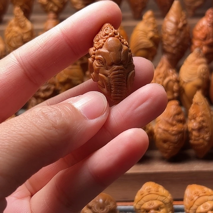 照***橄榄核吊坠橄榄核