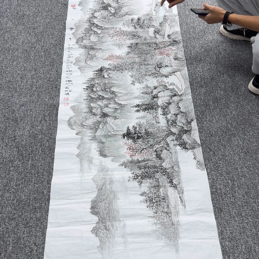 国画卖字画的小男孩