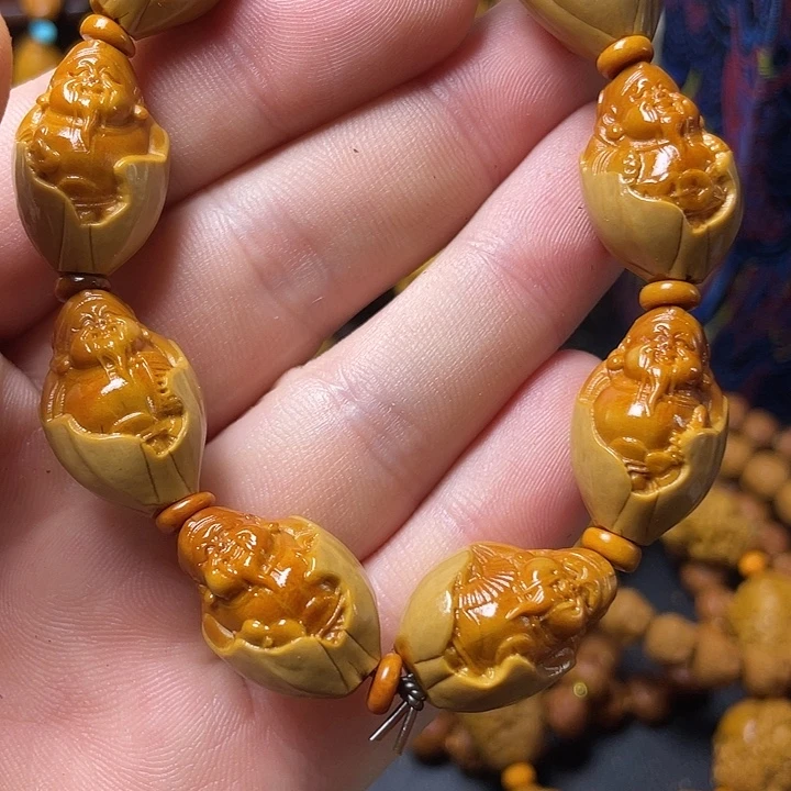 手串橄榄核他咯哦OK