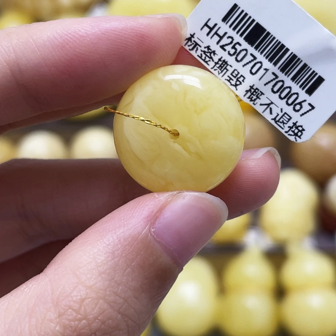 琥珀未镶嵌裸石19.1*10.4mm浓蜡白花扣子瑕