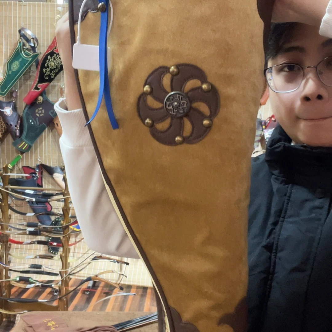 二层牛皮偏白色金融弓囊