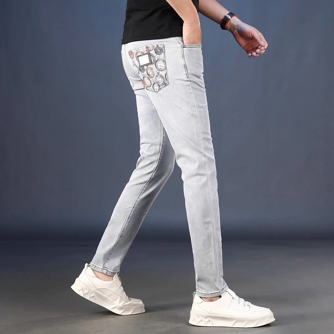 高级感浅色印花男士牛仔裤2025新款夏季薄款修身小脚弹力休闲长裤
