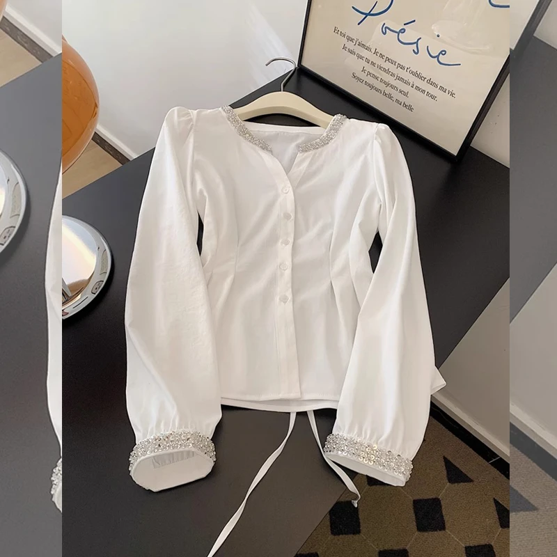 设计感别致独特亮片长袖衬衫上衣女早春新款内搭打底衫宽松百搭潮