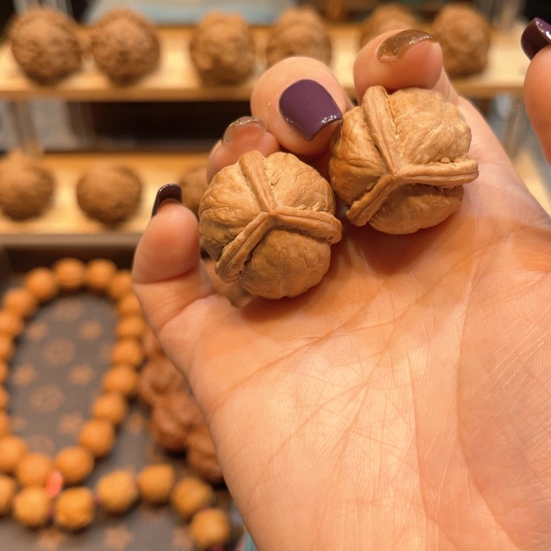 文玩核桃把件正奔手捻