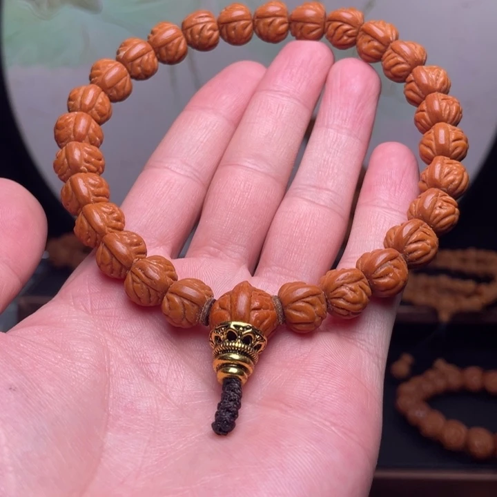 小***店手串桃核13金蟾手持