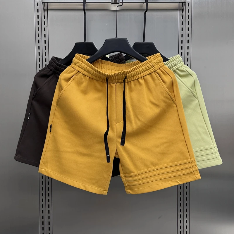 2025新款多巴胺重磅纯色薄款休闲短裤情侣夏季宽松三道杠运动中裤